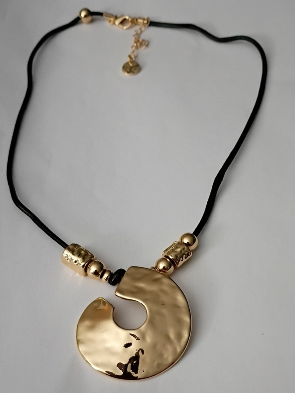 Jessica Simpson Gold-Tone Hammered Disc Pendant Necklace with Black Cord